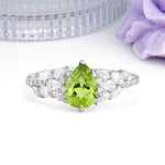 Luxurious Pavé-Set Diamonds, Unique 6-Prong Pear Cut Peridot Engagement Ring - Additional view
