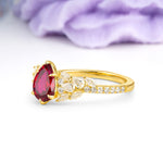 Luxurious Pavé-Set Diamonds, Unique 6-Prong Pear Cut Ruby Engagement Ring - Additional view