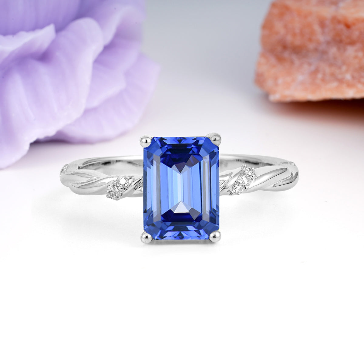 Classic Luxury Twisted 4-Prong Emerald Cut Sapphire Engagement Ring - Additional view