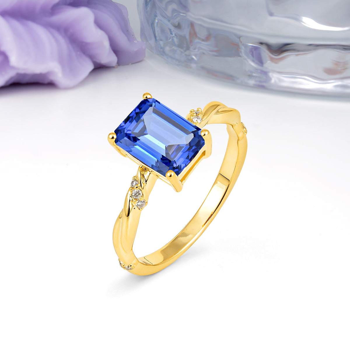 Classic Luxury Twisted 4-Prong Emerald Cut Sapphire Engagement Ring - Additional view