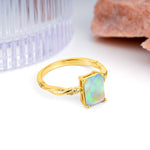 Classic Luxury Twisted 4-Prong Emerald Cut Fire Opal Engagement Ring - Additional view