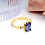 Classic Luxury Twisted 4-Prong Emerald Cut Tanzanite Engagement Ring - Additional view