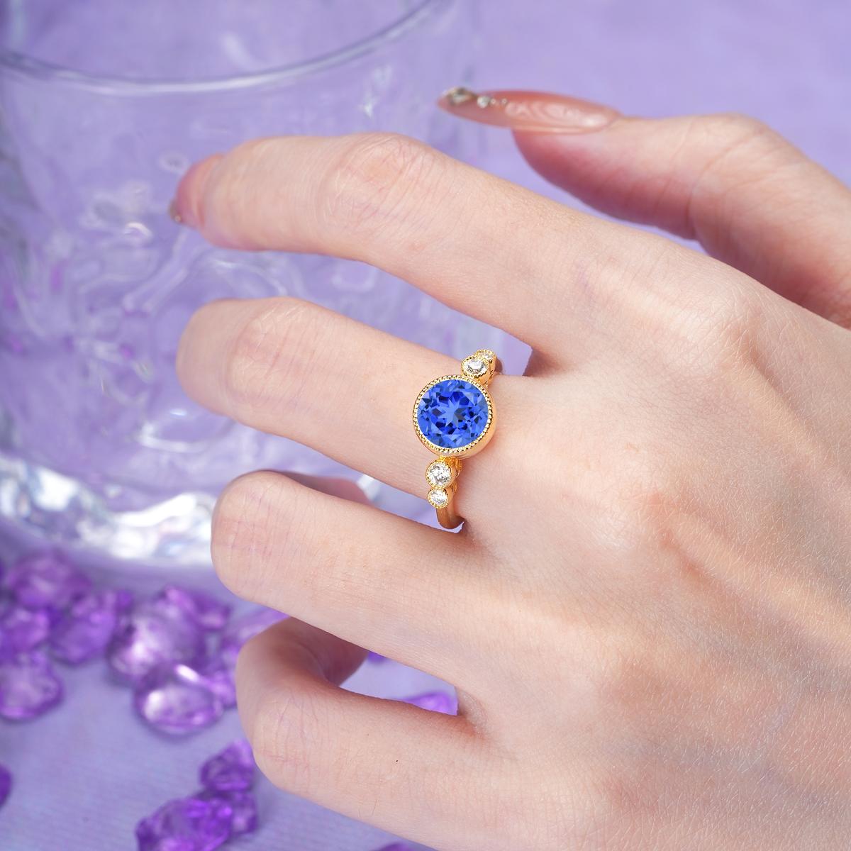 Classic Luxury Inset Round Cut Sapphire Engagement Ring