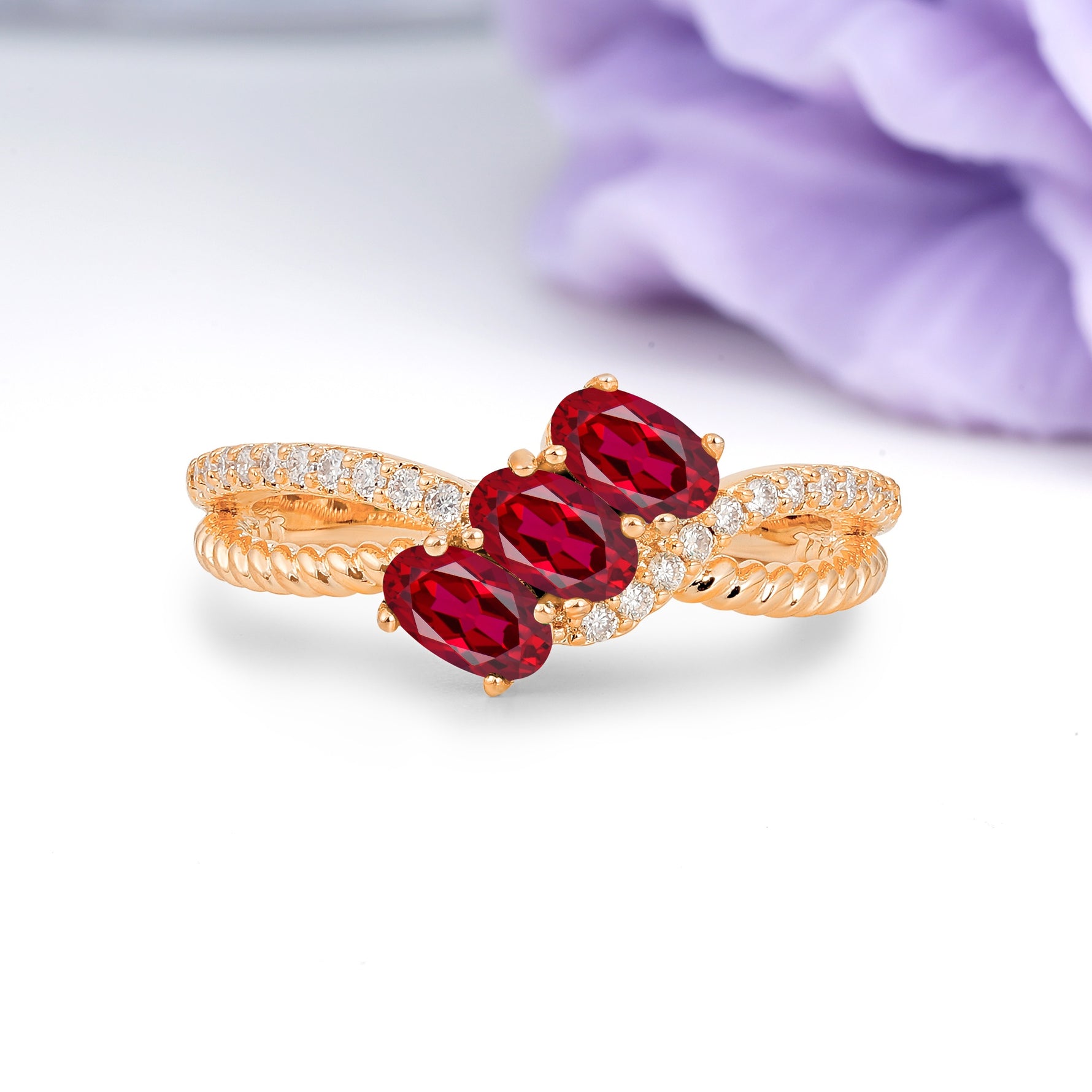 Luxurious Intertwined 4-Prong Oval Cut Ruby Three-Stone Wedding Ring - Additional view
