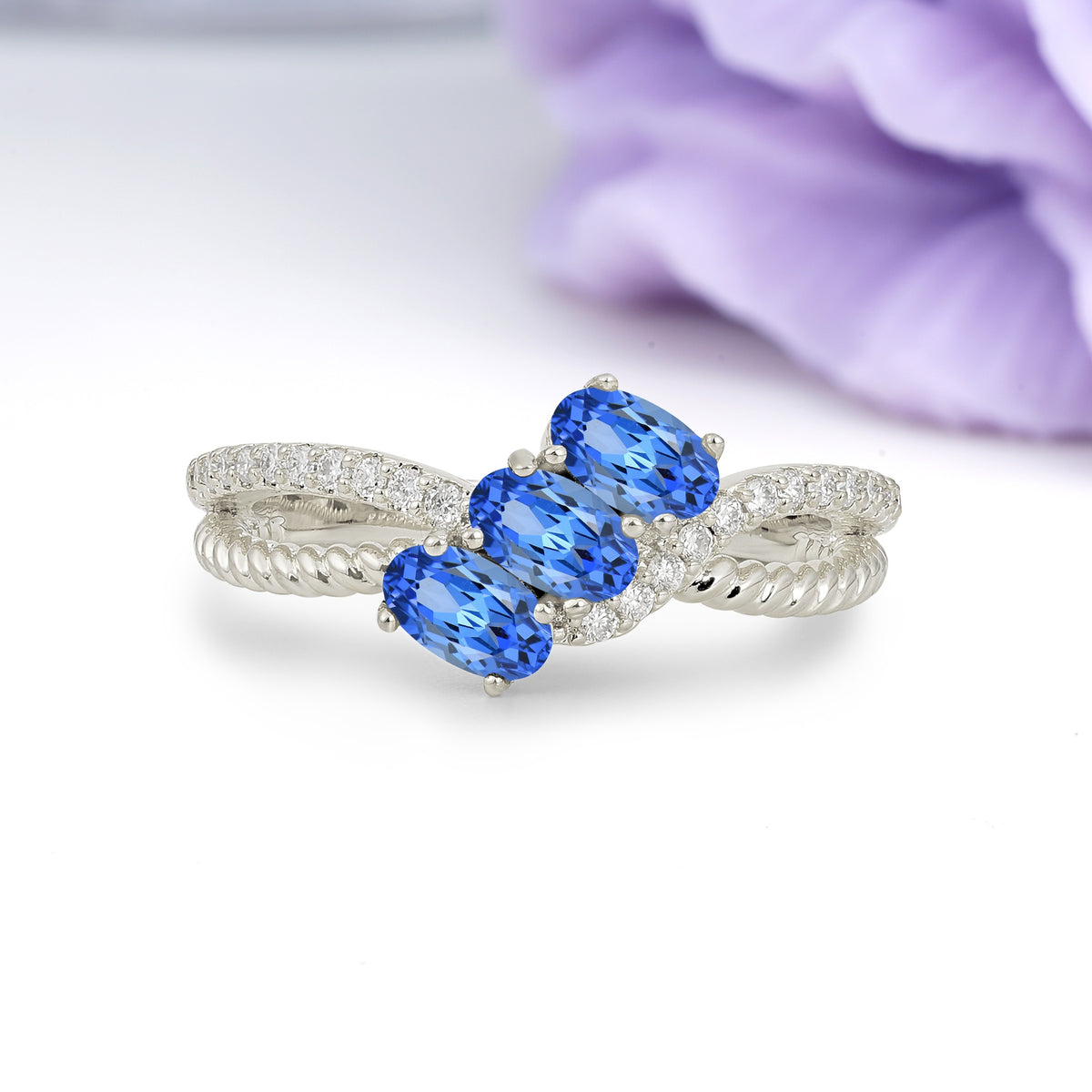 Luxurious And Unique 4 Prong Oval Cut Sapphire Three Stone Wedding Ring - Additional view
