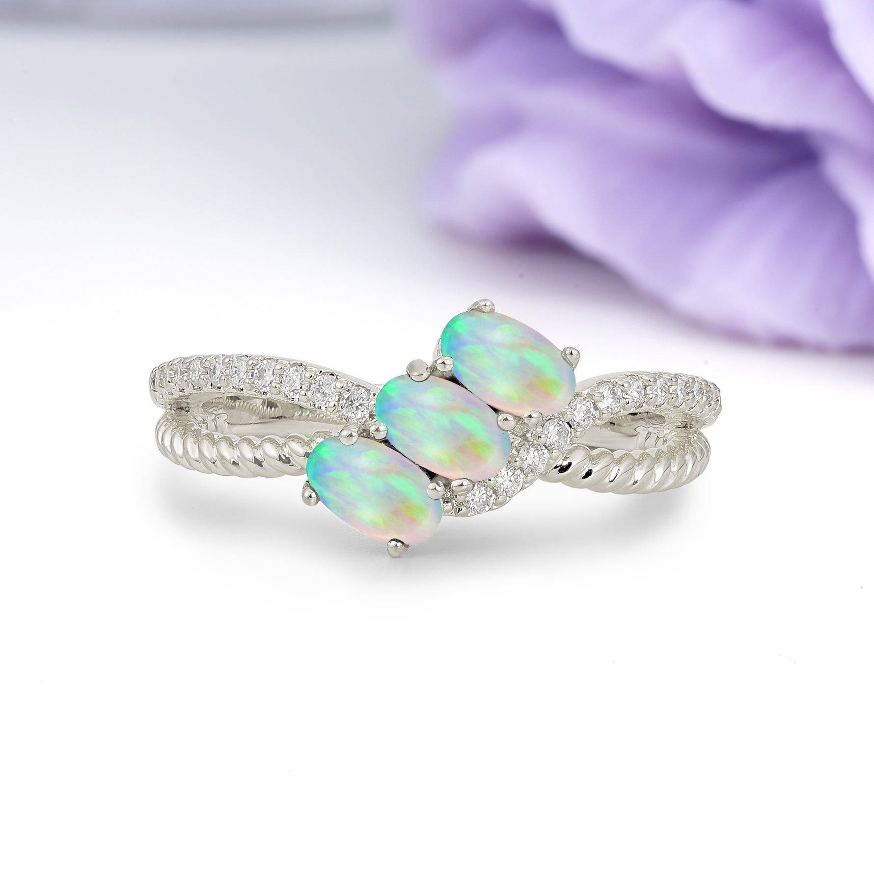 Luxurious Intertwined 4-Prong Oval Cut Fire Opal Three-Stone Wedding Ring - Additional view