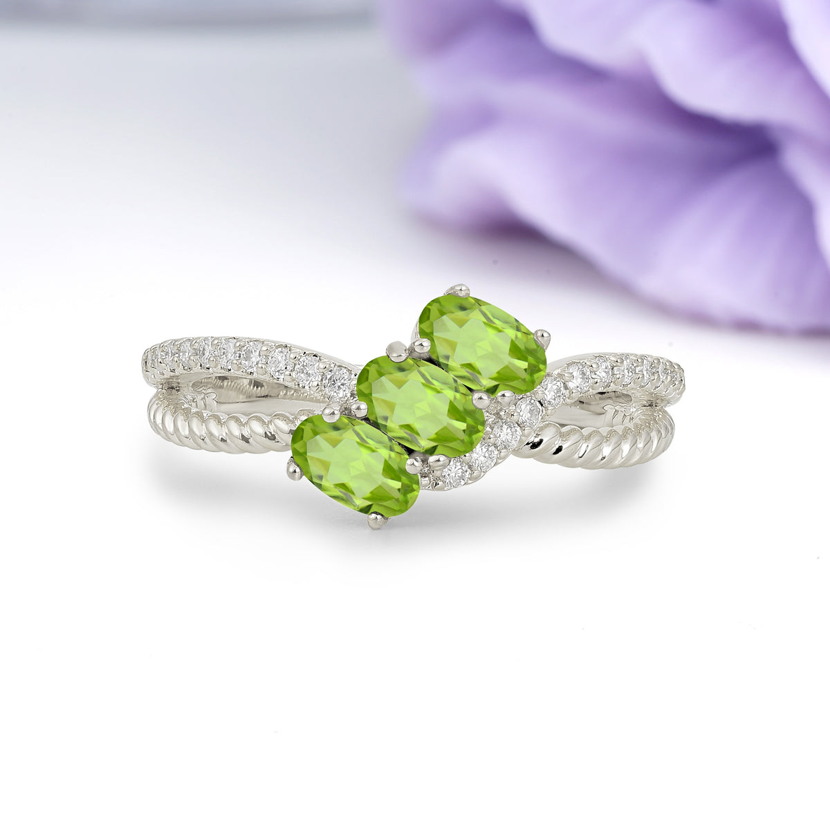 Luxurious And Unique 4 Prong Oval Cut Peridot Three Stone Wedding Ring - Additional view