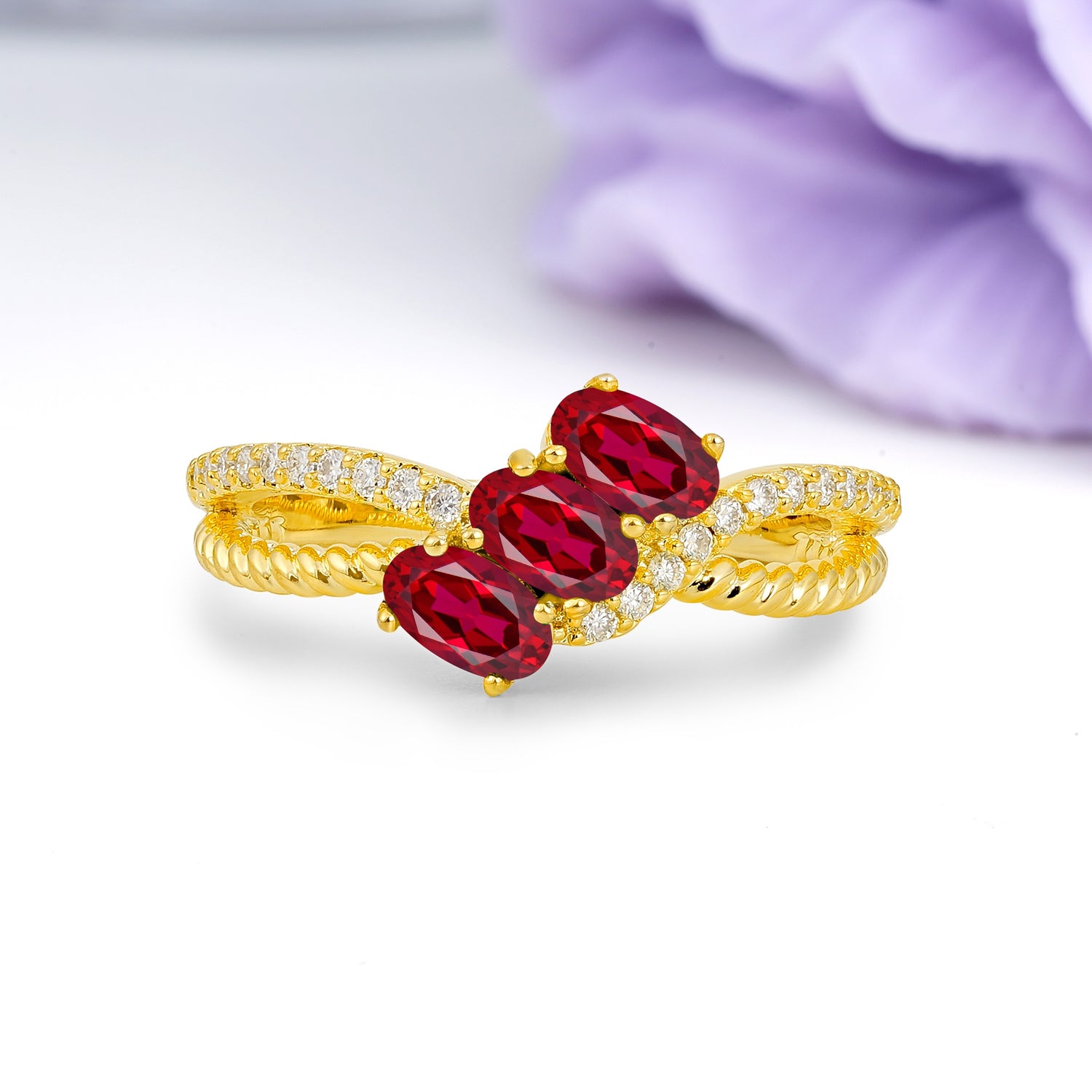 Luxurious Intertwined 4-Prong Oval Cut Ruby Three-Stone Wedding Ring - Additional view