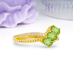 Luxurious Intertwined 4-Prong Oval Cut Peridot Three-Stone Wedding Ring - Additional view