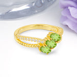 Luxurious Intertwined 4-Prong Oval Cut Peridot Three-Stone Wedding Ring - Additional view