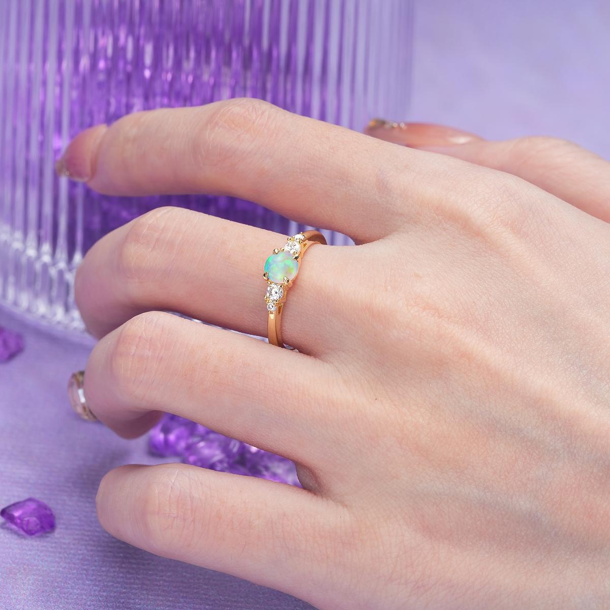 Simply Luxurious 4-Prong Round Cut Fire Opal Engagement Ring