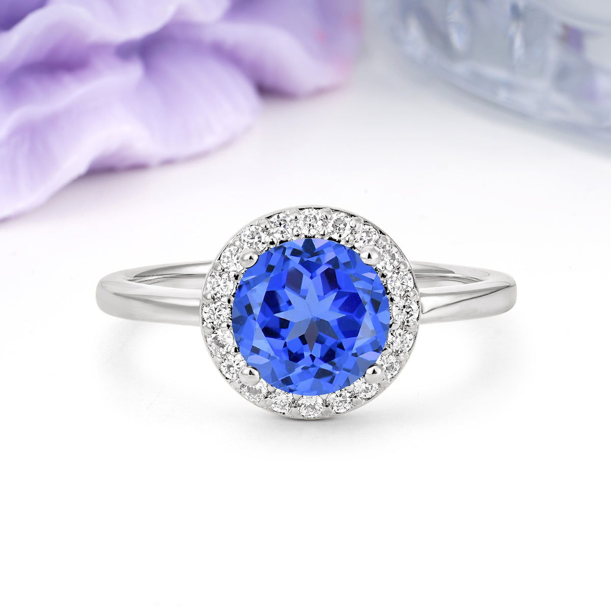 Luxurious 4-Prong Round Cut Sapphire Engagement Ring - Additional view