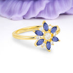 Symmetric Six Marquise Snowflake Cluster Center Round Cut Tanzanite Engagement Ring - Additional view
