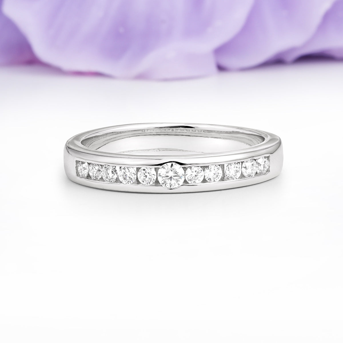 Half Channel Set Graduated Center Large Round Cut Moissanite Wedding Ring - Additional view