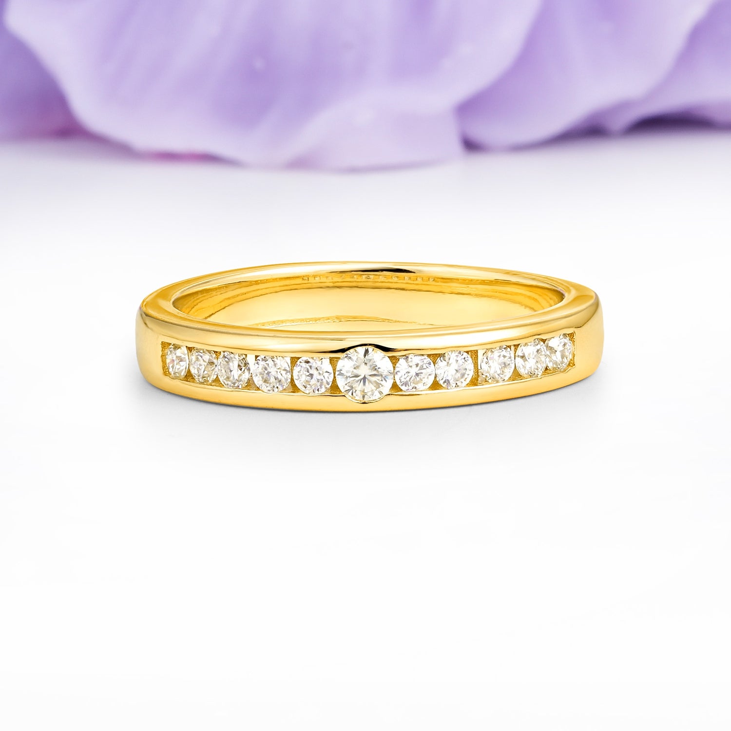 Half Channel Set Graduated Center Large Round Cut Moissanite Wedding Ring - Additional view