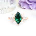 Large Marquise Center Solitaire Symmetric Three Marquise Cut Side PetalEmerald Engagement Ring - Additional view