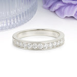 Half Eternity Channel Set Continuous Round Cut Flat Edge Moissanite Wedding Ring - Additional view