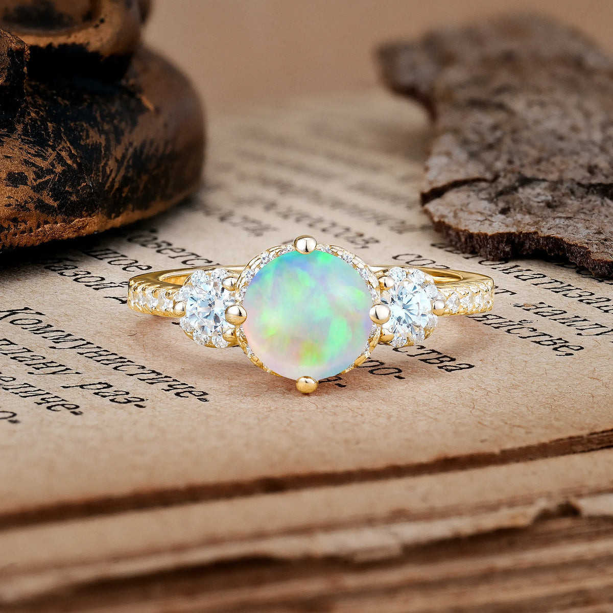 Luxurious and Dazzling 4 Prong Round Cut Fire Opal Engagement Ring
