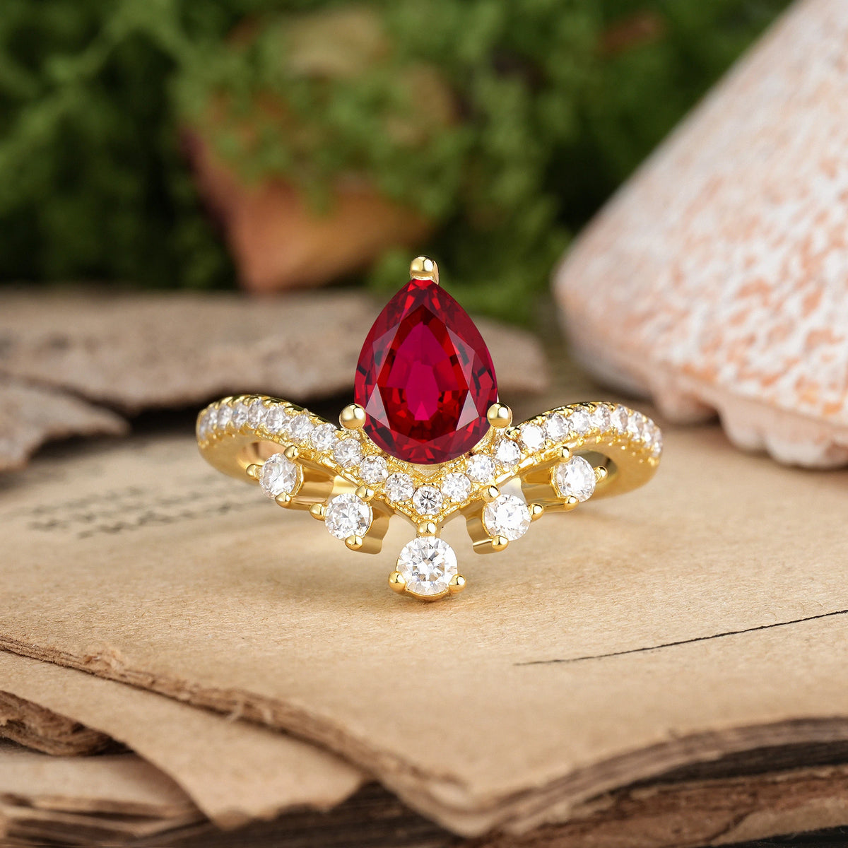 Pear Cut Ruby Luxurious and Unique Crown Style 3 Prong Engagement Ring
