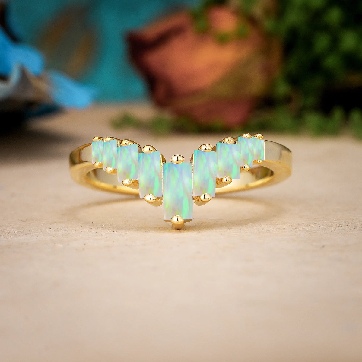 Emerald Cut Fire Opal Elegant Soft Mountain Peak V Shape Graduated Wedding Ring