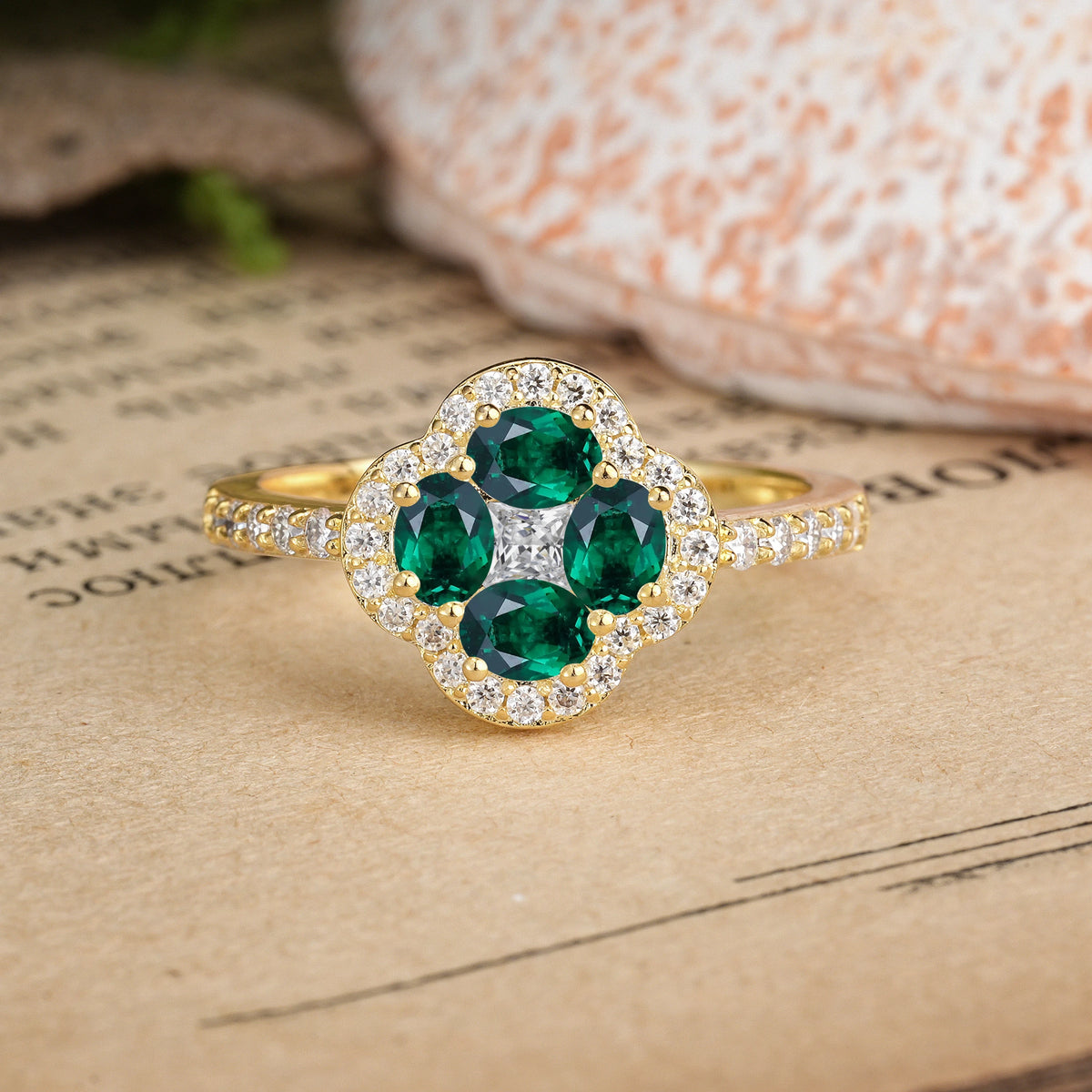 Oval Cut Emerald Unique Flower-Shaped 4-Prong Engagement Ring