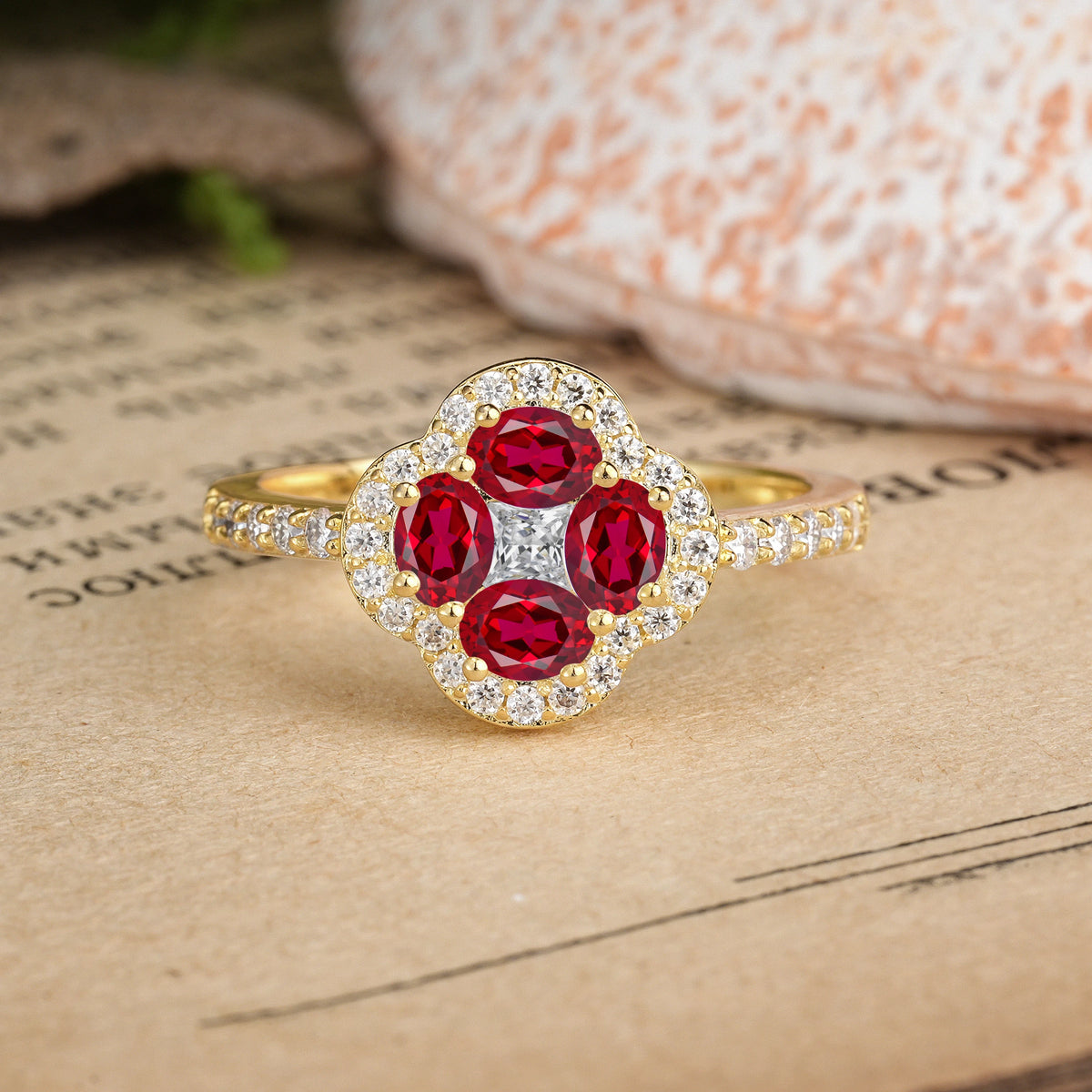 Oval Cut Ruby Unique Flower-Shaped 4-Prong Engagement Ring