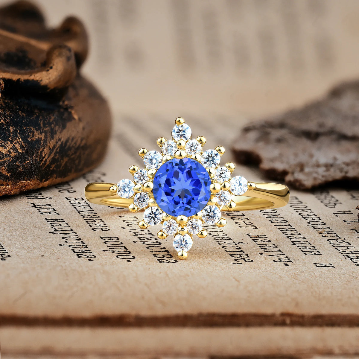 Distinctive 4 Prong Round Cut Sapphire Engagement Ring