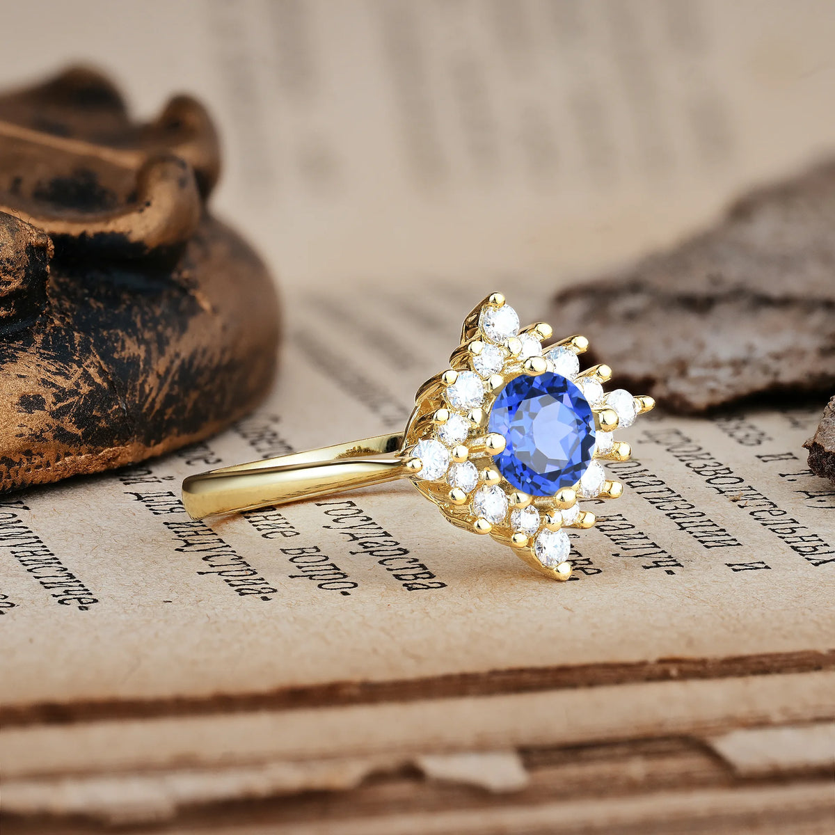 Distinctive 4 Prong Round Cut Sapphire Engagement Ring