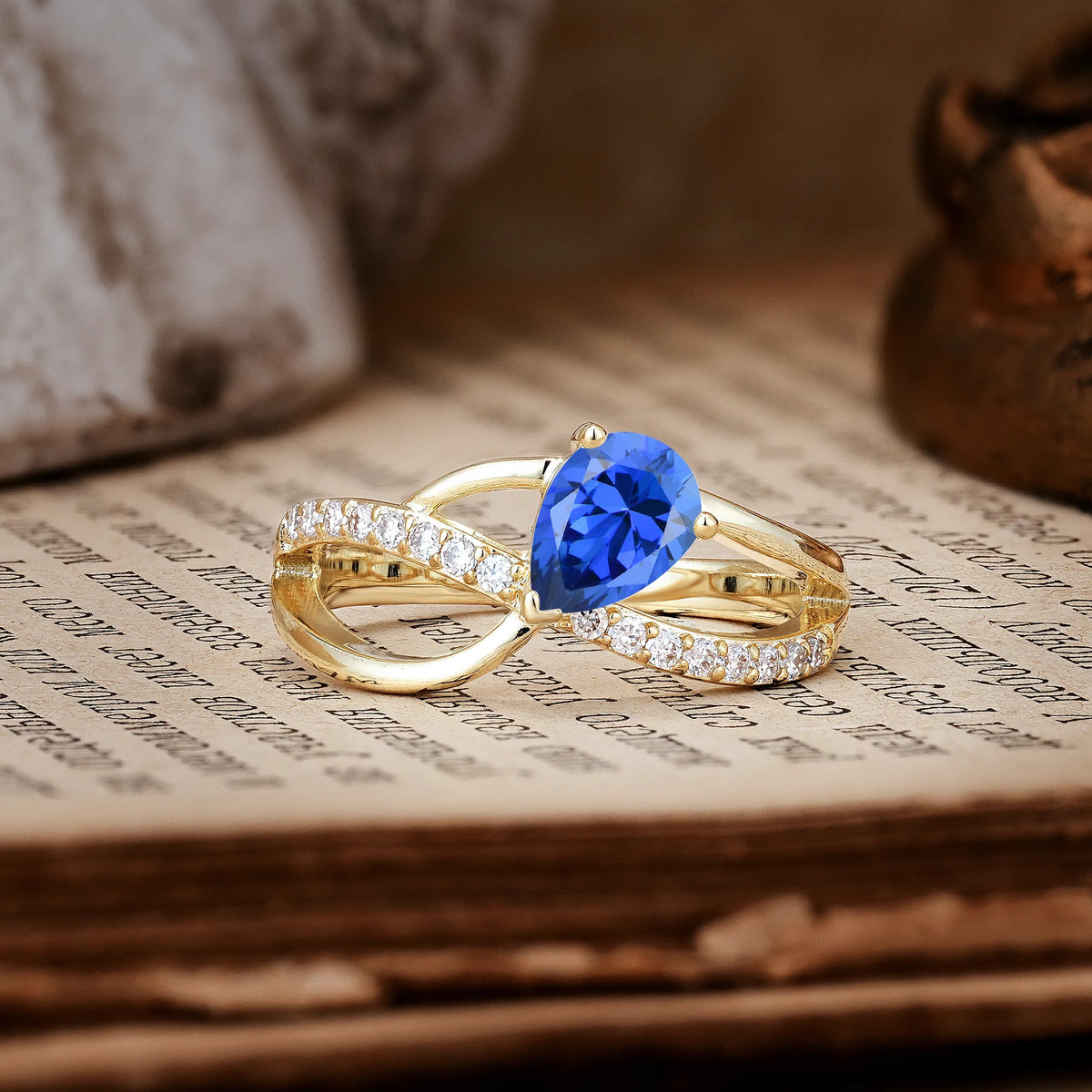 Classic Twisted 3-Prong Pear Cut Sapphire Engagement Ring