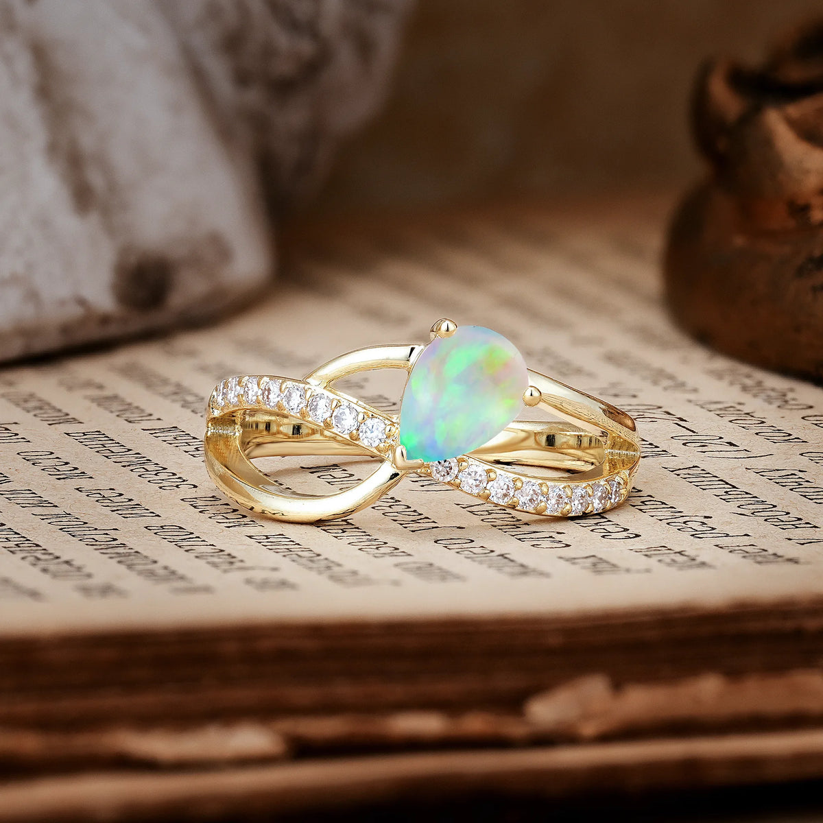 Classic Twisted 3-Prong Pear Cut Fire Opal Engagement Ring