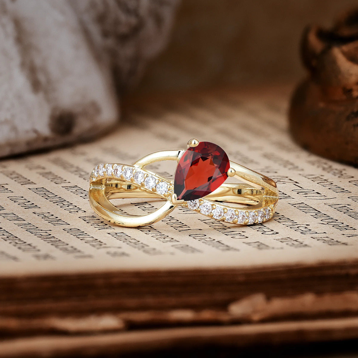 Classic Twisted 3-Prong Pear Cut Garnet Engagement Ring