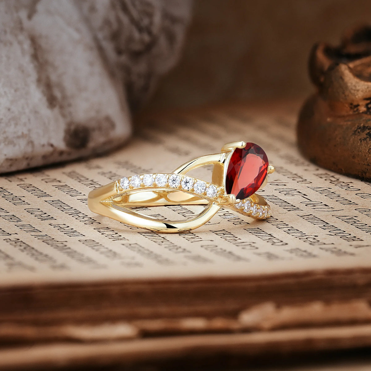 Classic Twisted 3-Prong Pear Cut Garnet Engagement Ring