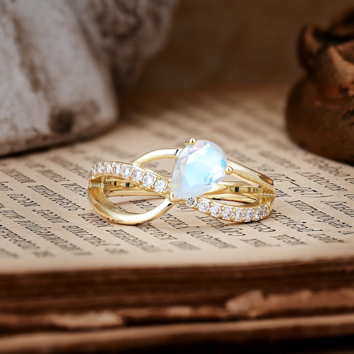 Classic Twisted 3-Prong Pear Cut Moonstone Engagement Ring