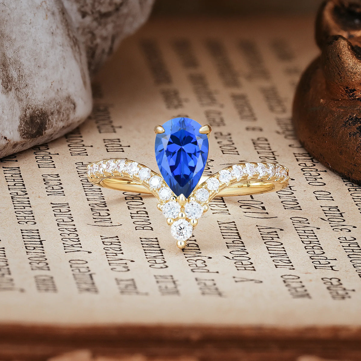 Luxurious Crown 3-Prong Pear Cut Sapphire Engagement Ring