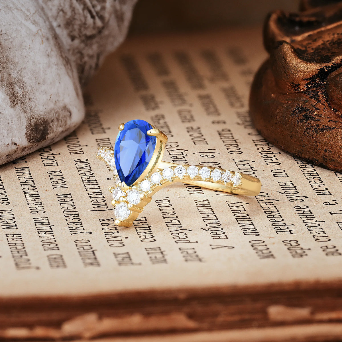 Luxurious Crown 3-Prong Pear Cut Sapphire Engagement Ring