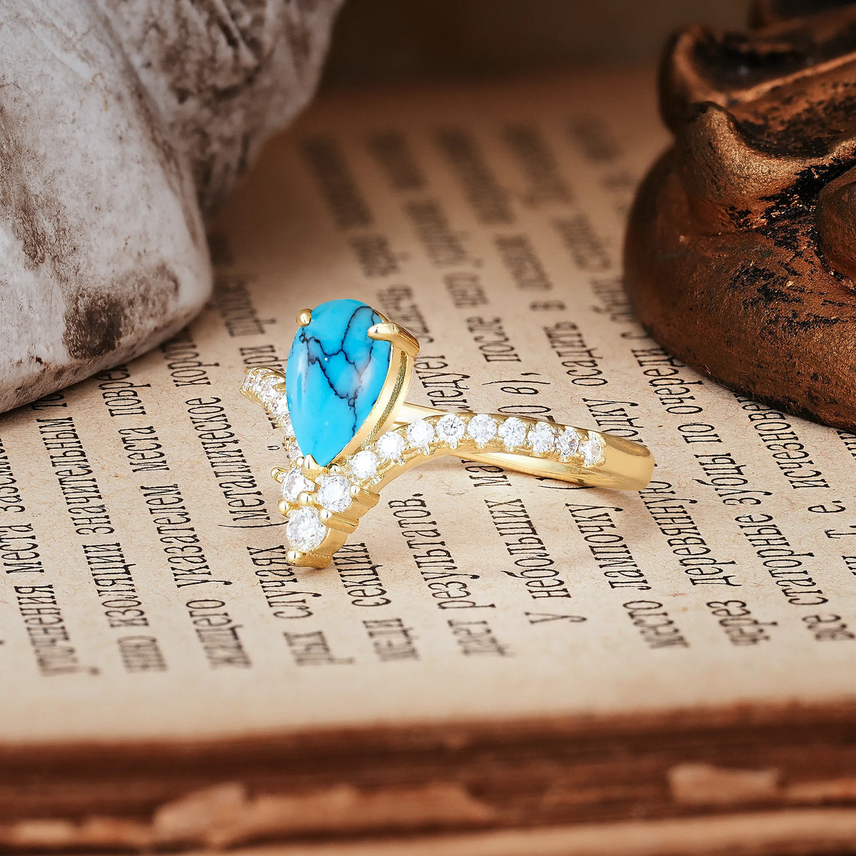 Luxurious Crown 3-Prong Pear Cut Turquoise Engagement Ring