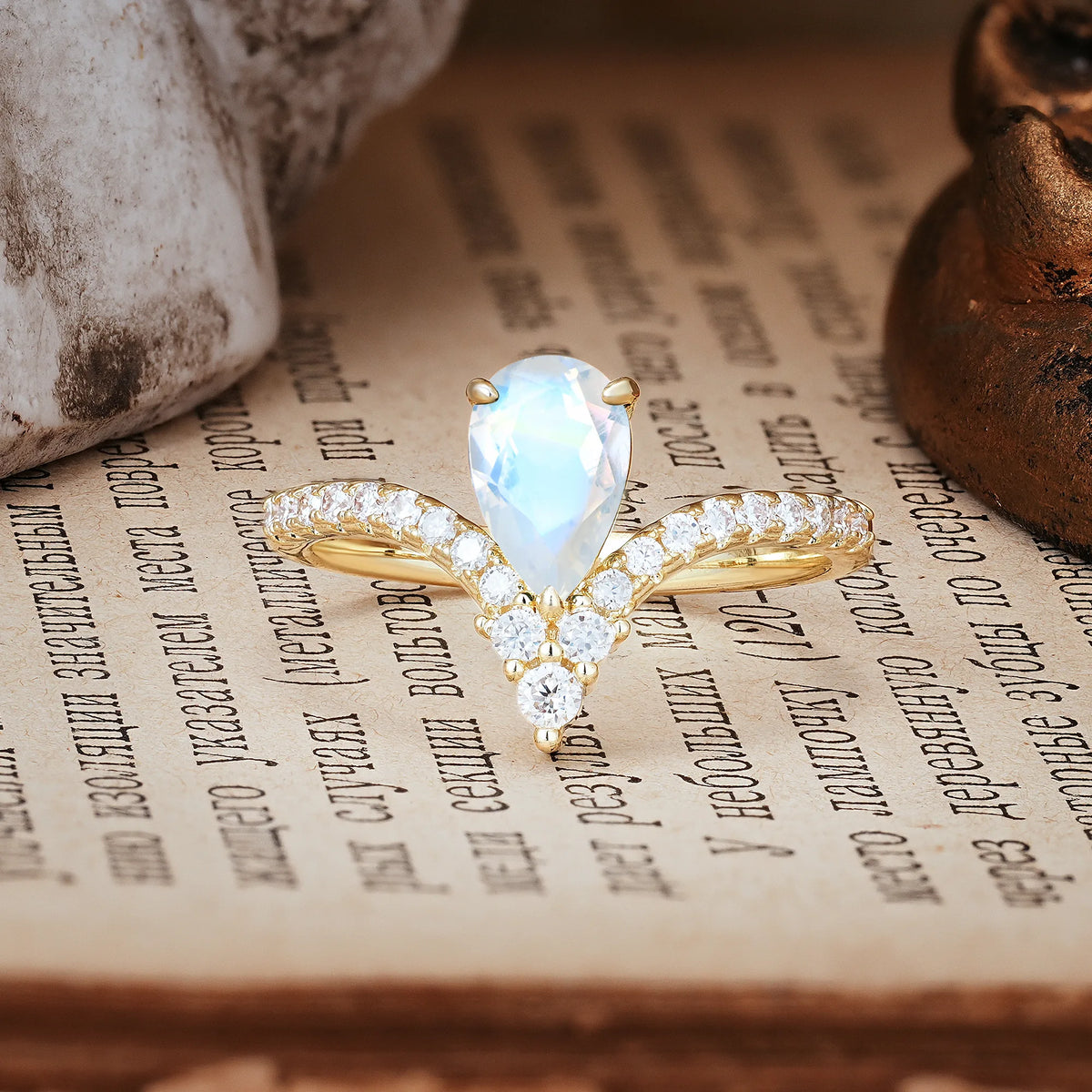 Luxurious Crown 3-Prong Pear Cut Moonstone Engagement Ring