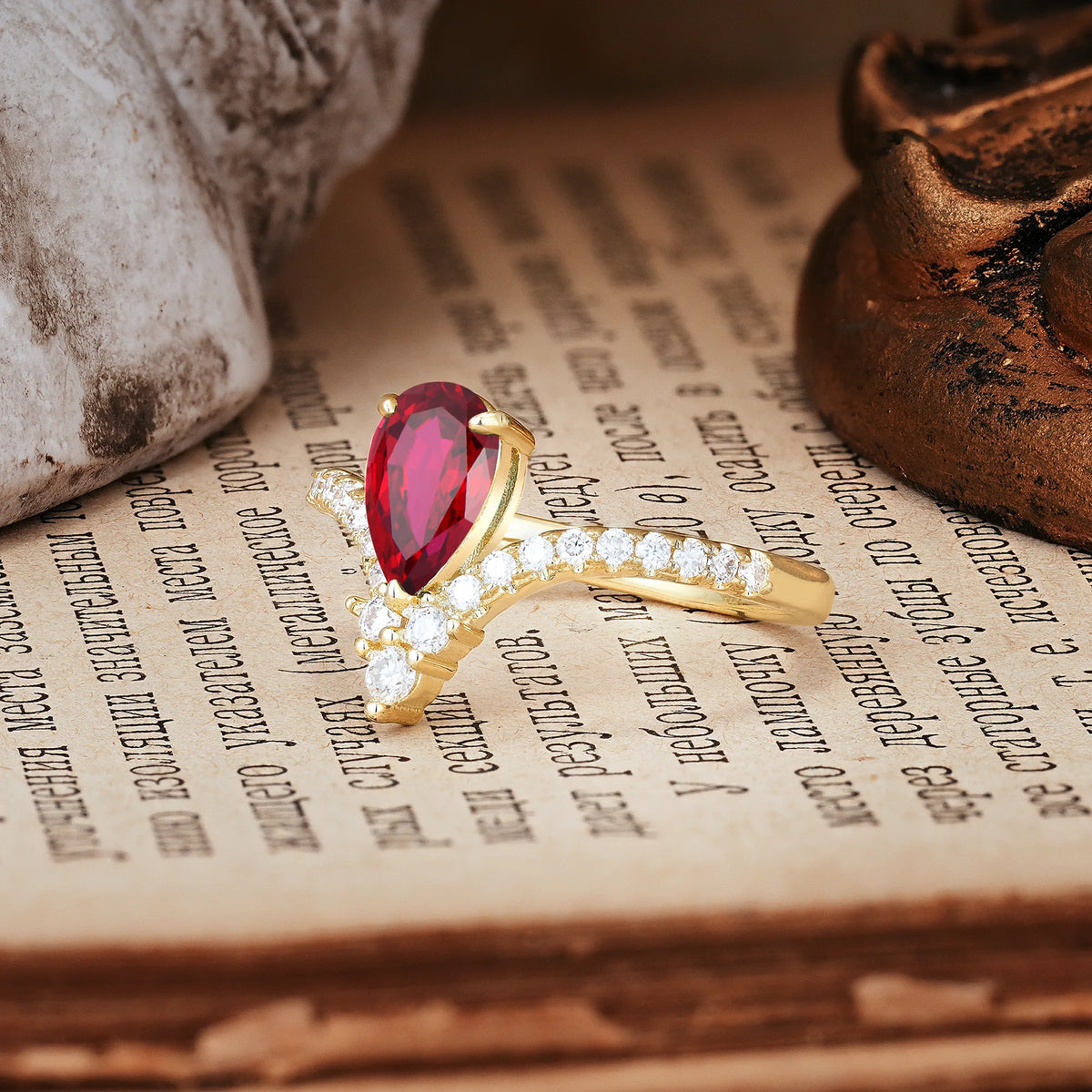 Luxurious Crown 3-Prong Pear Cut Ruby Engagement Ring
