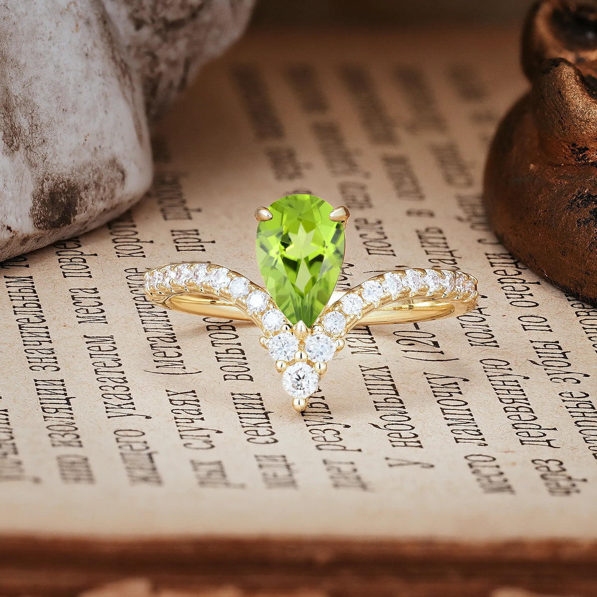 Luxurious Crown 3-Prong Pear Cut Peridot Engagement Ring