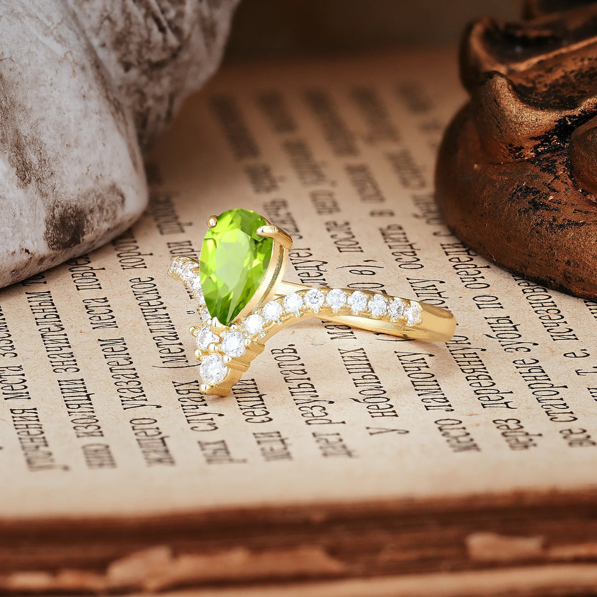 Luxurious Crown 3-Prong Pear Cut Peridot Engagement Ring