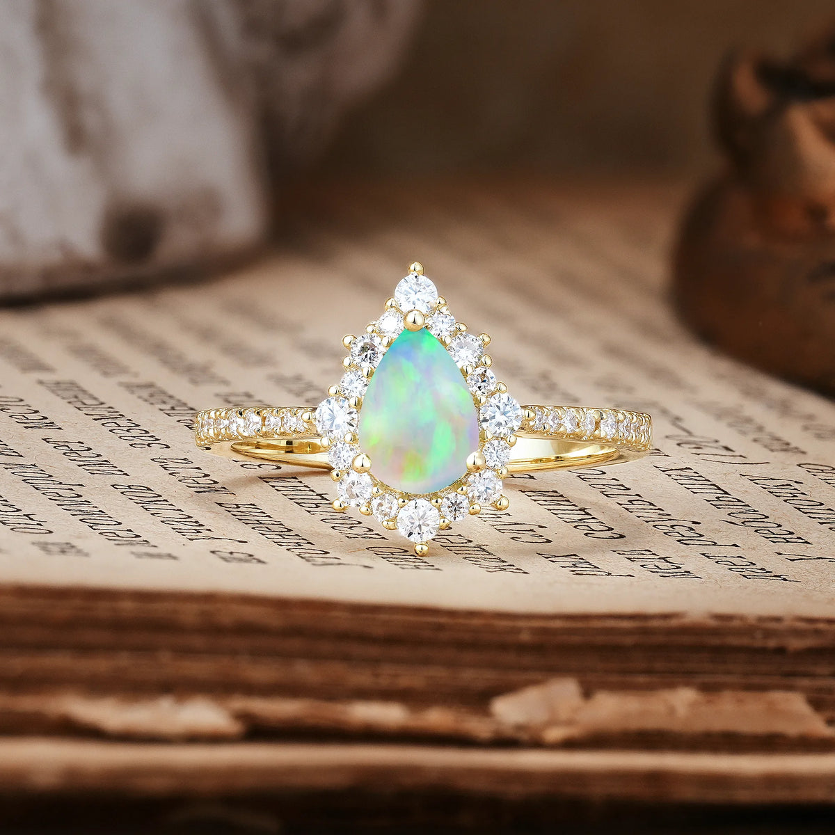 Classic Pavé-Set, Luxurious 3-Prong Pear-Cut Fire Opal Engagement Ring