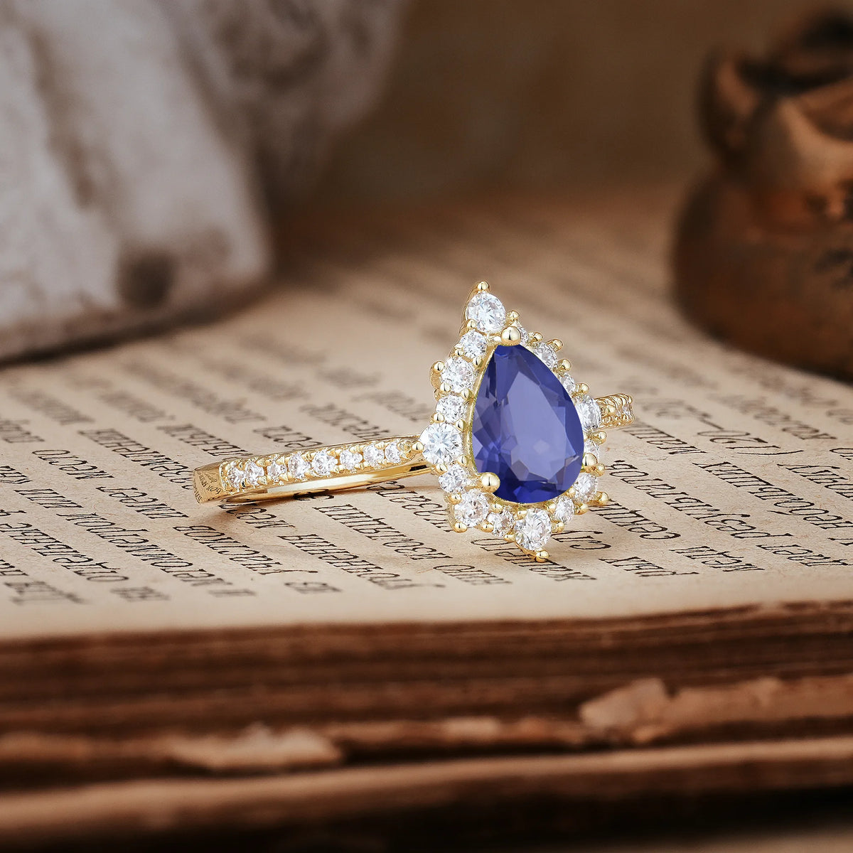 Classic Pavé-Set, Luxurious 3-Prong Pear-Cut Tanzanite Engagement Ring