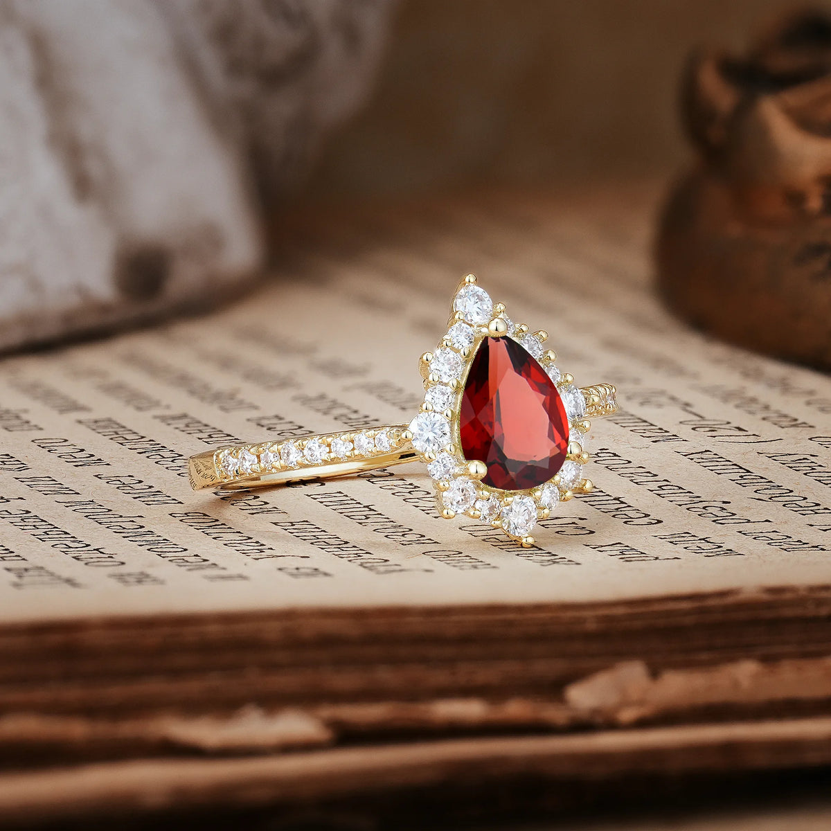 Classic Pavé-Set, Luxurious 3-Prong Pear-Cut Garnet Engagement Ring