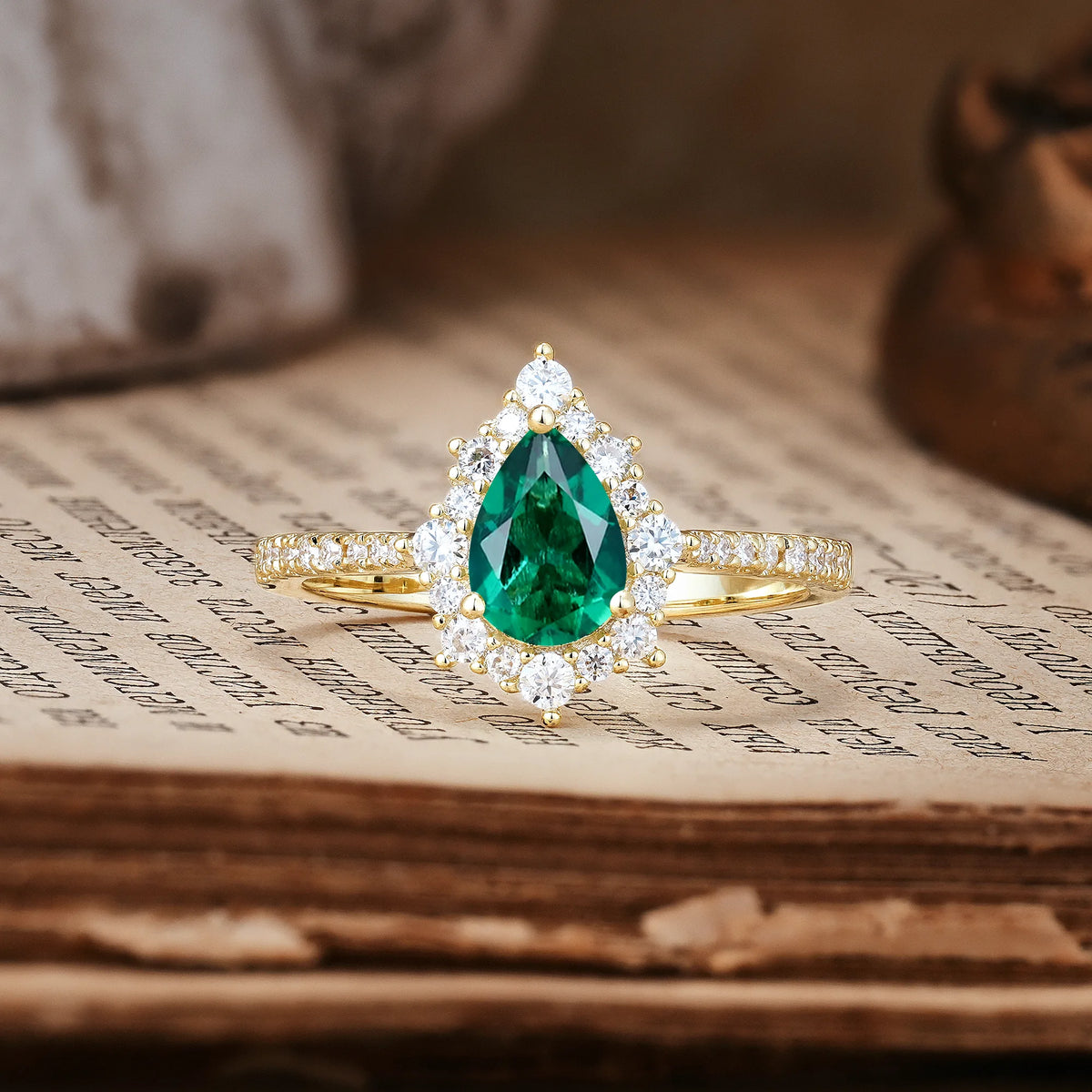 Classic Pavé-Set, Luxurious 3-Prong Pear-Cut Emerald Engagement Ring