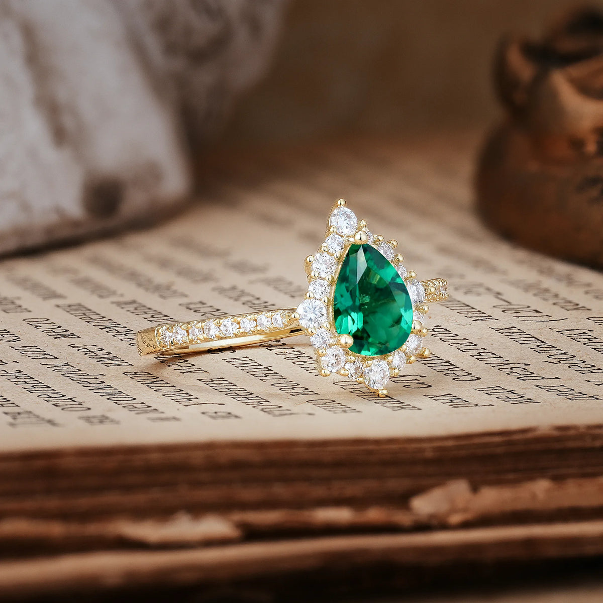 Classic Pavé-Set, Luxurious 3-Prong Pear-Cut Emerald Engagement Ring