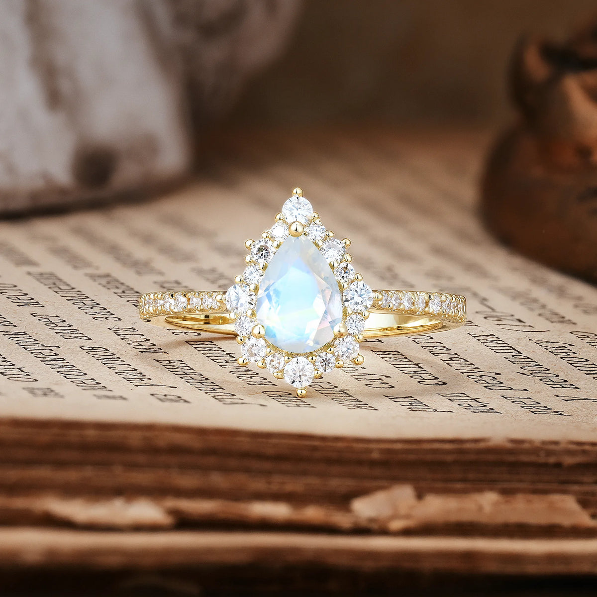 Classic Pavé-Set, Luxurious 3-Prong Pear-Cut Moonstone Engagement Ring