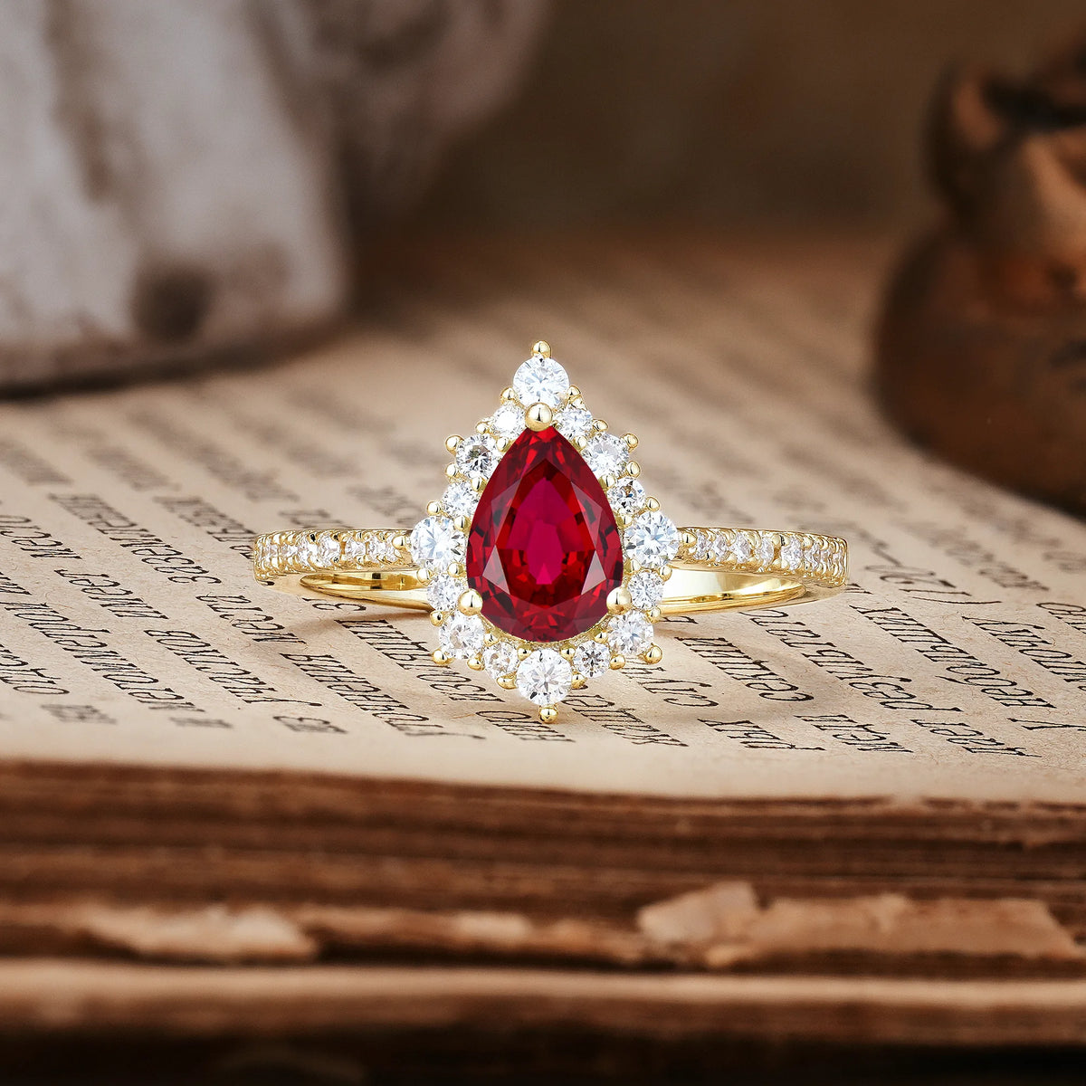 Classic Pavé-Set, Luxurious 3-Prong Pear-Cut Ruby Engagement Ring