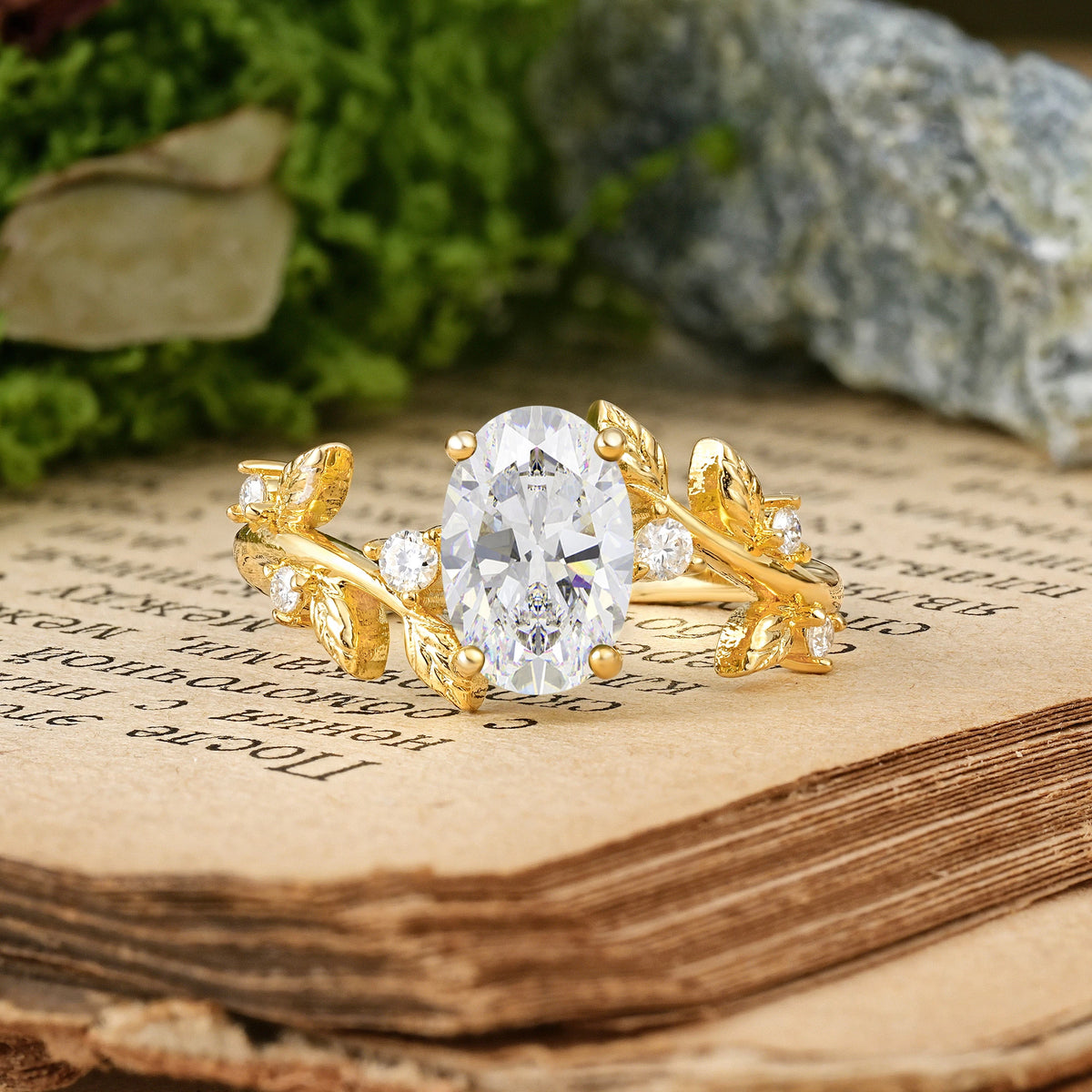 Oval Cut Moissanite Nature Inspired Four Prong Leaf Vine Accent Engagement Ring