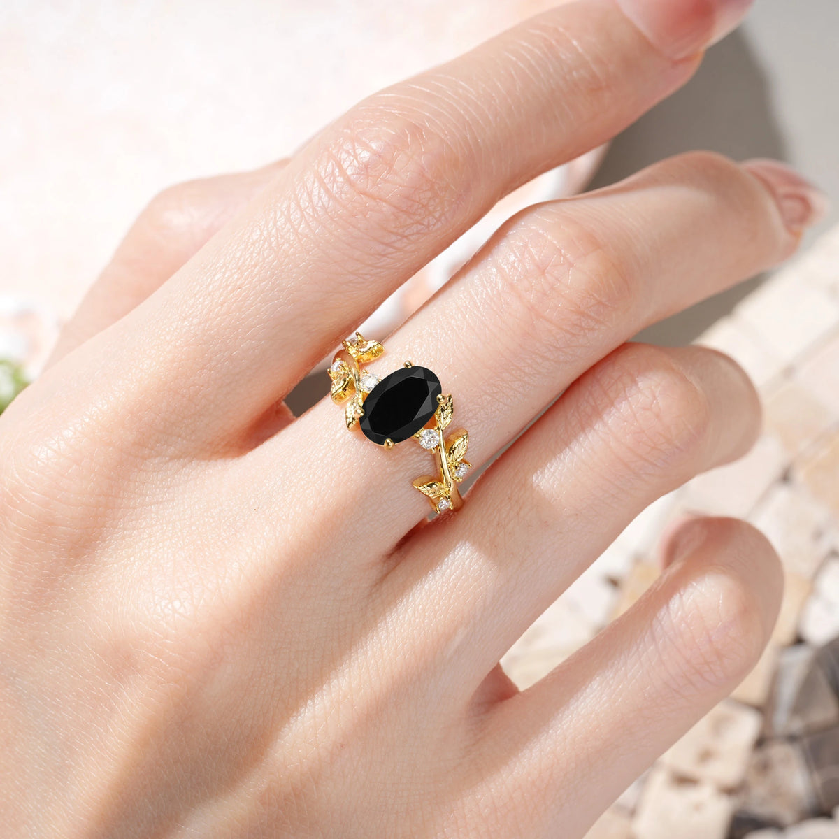 Oval Cut Black Onyx Nature Inspired Four Prong Leaf Vine Accent Engagement Ring