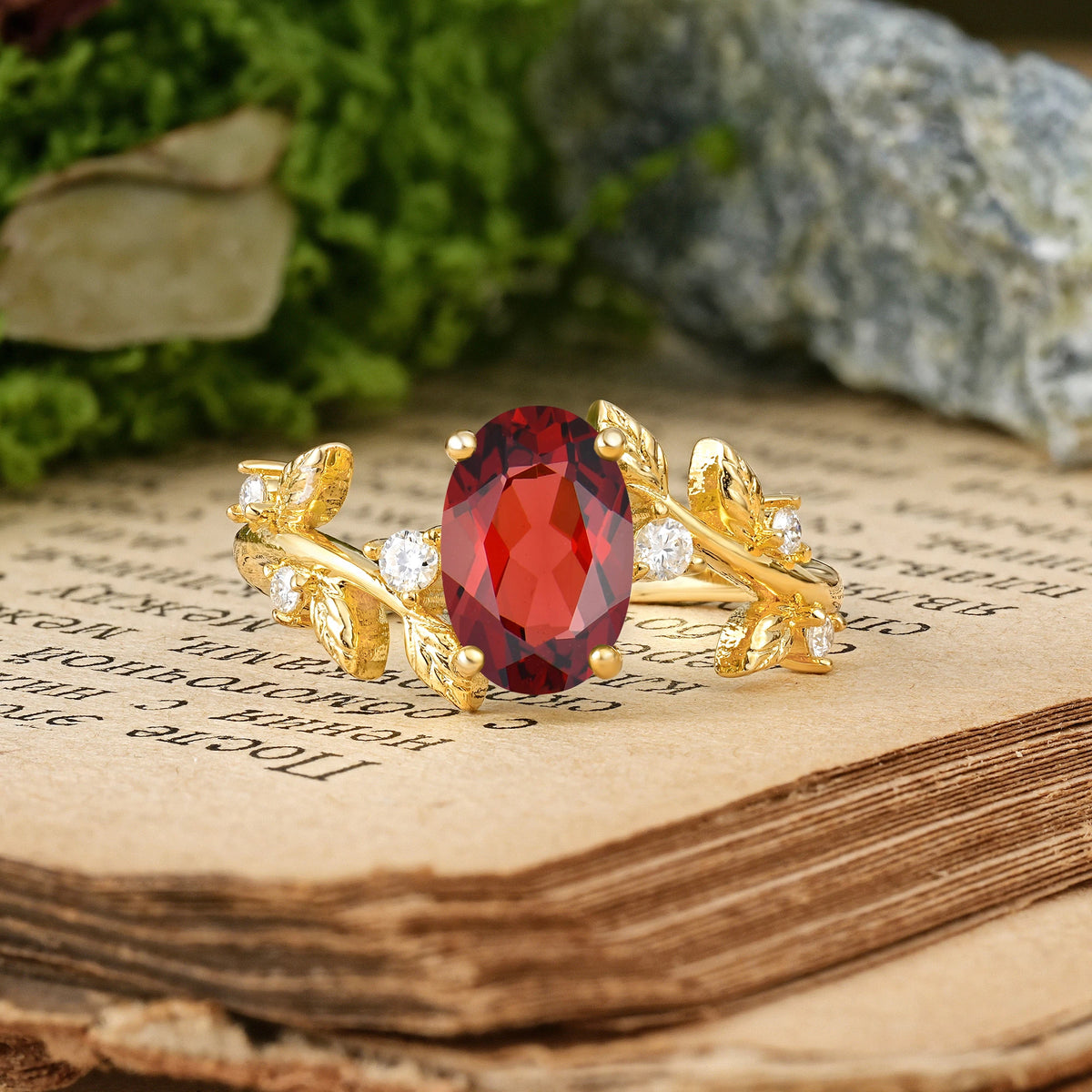 Oval Cut Garnet Nature Inspired Four Prong Leaf Vine Accent Engagement Ring